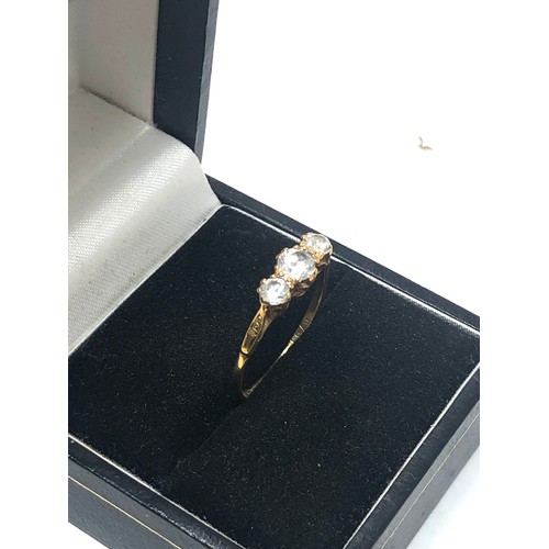 226 - 18ct gold zircon trilogy ring (1.7g)