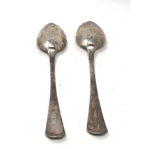 53 - Pair of antique georgian silver berry spoons