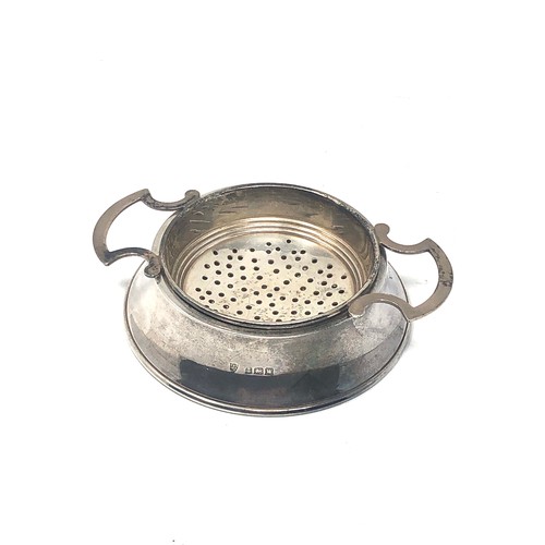 47 - Silver tea strainer Birmingham silver hallmarks measures approx 11.5cm wide 7cm dia