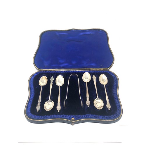 84 - Boxed set of antique silver tea spoons & sugar tong