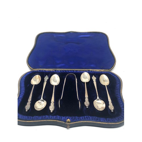 84 - Boxed set of antique silver tea spoons & sugar tong