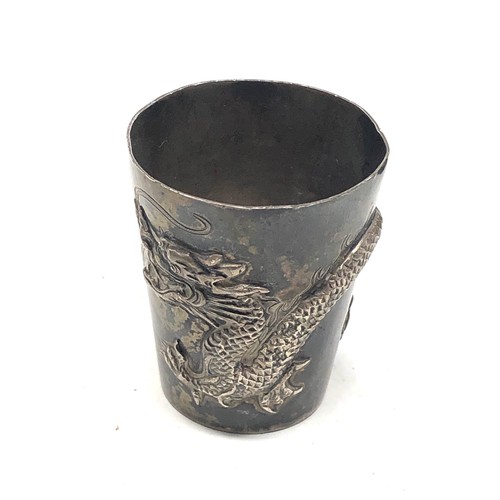 85 - Small antique silver cup with dragon detail