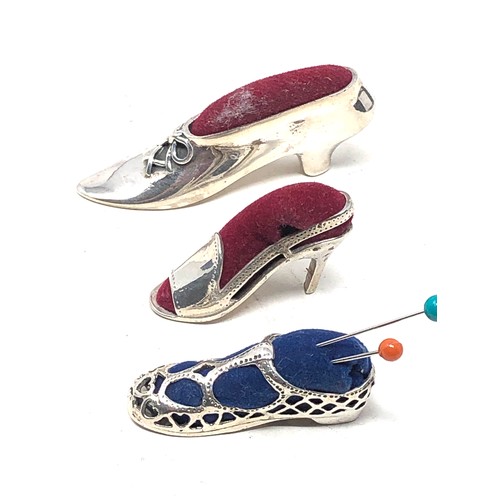 77 - 3 modern silver shoe pin cushions