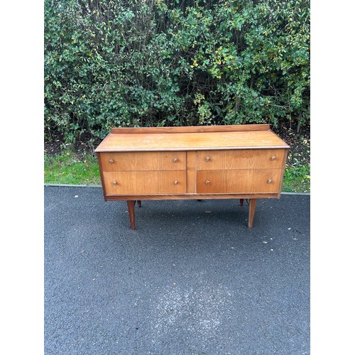 592 - Retro Teak 4 drawer long, low chest, approximate measurements: Height 29 inches, Length 54 inches, D... 