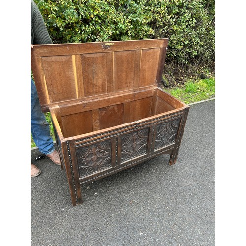 584 - Antique oak carved 3 panelled blanket box / coffer, approximate height 27.5 inches, Width 47 inches,... 