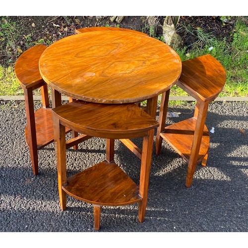 588 - Walnut circle nest of 4 tables, damage to edge of veneer measures approx 19 inches tall 23 inches di... 