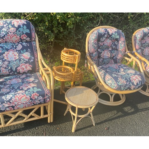 623 - Conservatory set to include four chairs two spinning and two normal and two wicker planters and tabl... 