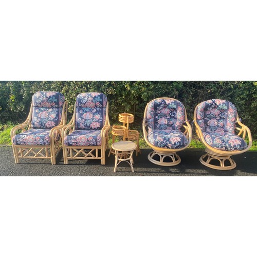 623 - Conservatory set to include four chairs two spinning and two normal and two wicker planters and tabl... 