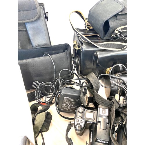 130 - Large selection of cameras and camera equipment, to include Nikon, Prakticar, Soligor etc