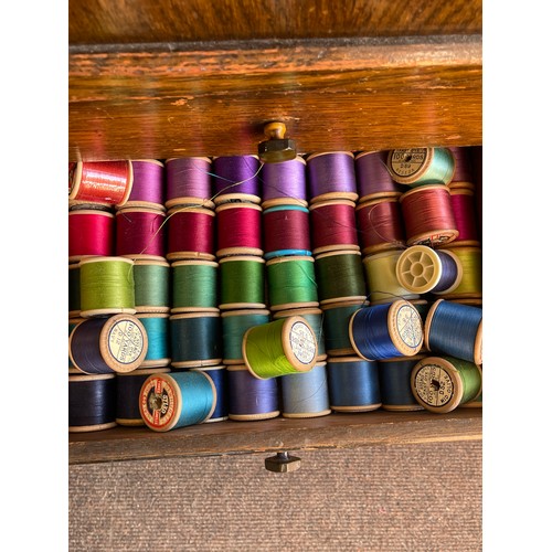 611 - Vintage oak sewing box with a large selection of assorted sewing items