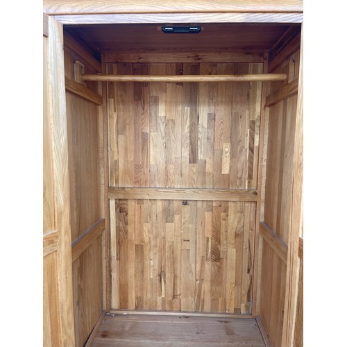 618 - 2 door 1 drawer oak wardrobe measures approx 75 inches tall 39 inches wide 25.5 inches deep