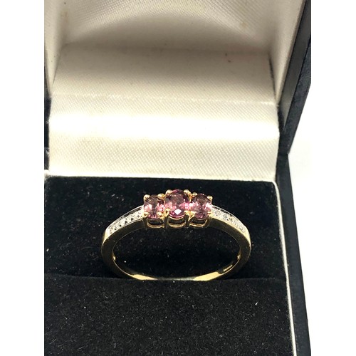 111 - 9ct gold pink gemstone  & diamond ring weight 2.6 g