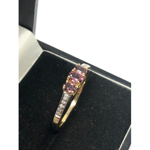 111 - 9ct gold pink gemstone  & diamond ring weight 2.6 g