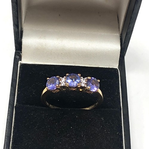 119 - 9ct gold Tanzanite & diamond ring weight 2.7g