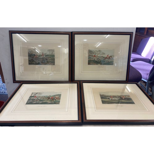 152 - Selection of 4 hunting scene prints largest measures approx 17.5 inches wide by 15 inches tall