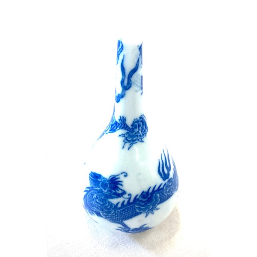 133 - Blue and white rose vase, marks to base, dragon design, height 5 inches