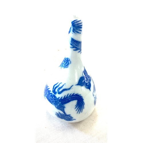 133 - Blue and white rose vase, marks to base, dragon design, height 5 inches