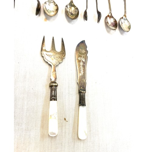 83 - Selection of silver plated cutlery includes art deco knife set