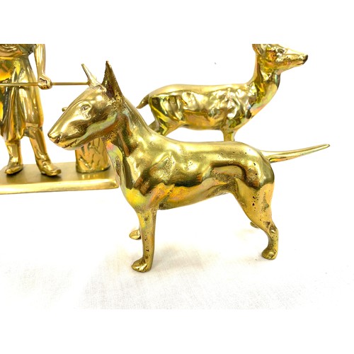 32 - 3 Heavy brass figures includes a Deer, Dog and a Black smith tallest measures 8 inches