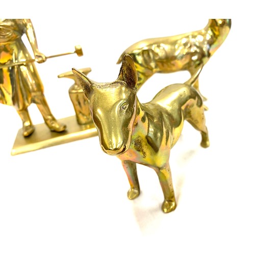 32 - 3 Heavy brass figures includes a Deer, Dog and a Black smith tallest measures 8 inches