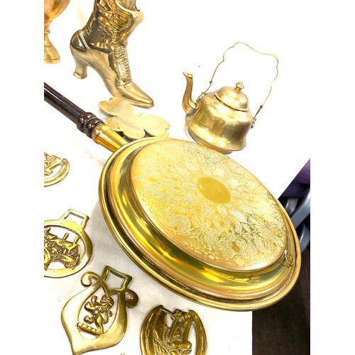 231 - Selection of assorted brass ware includes warming pan, a boot, clock etc