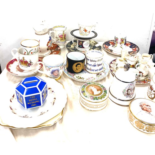 291 - Large selection of commemorative ware includes mugs, bells etc