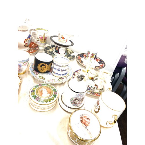 291 - Large selection of commemorative ware includes mugs, bells etc