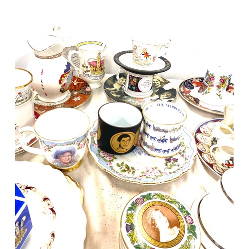 291 - Large selection of commemorative ware includes mugs, bells etc