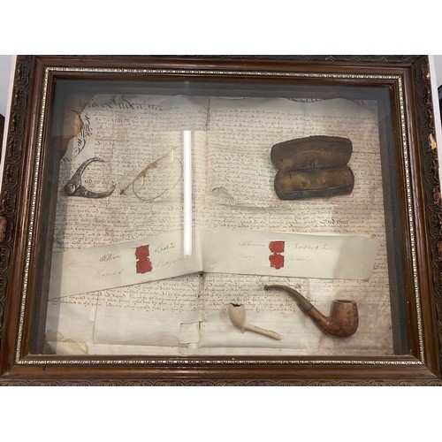 234 - Cased diorama includes spectacles and smoking pipes, case measures approx 16 inches by 21 inches