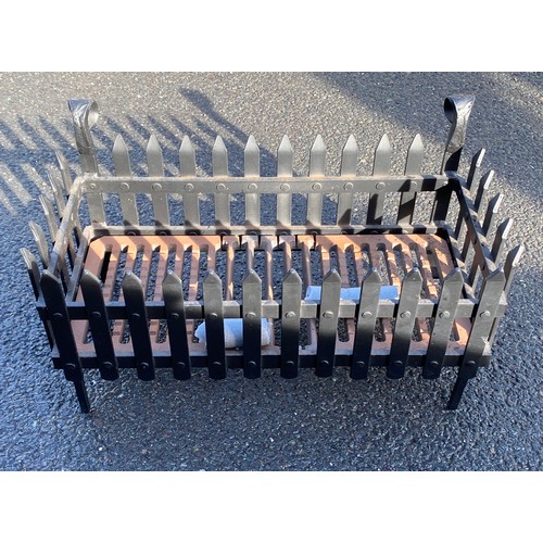 271 - Cast iron fire grate measures approx 24 inches wide 14 inches deep 13 inches tall