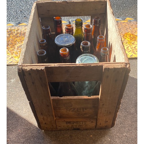 244 - Tiger beer crate and a selection of old beer bottles