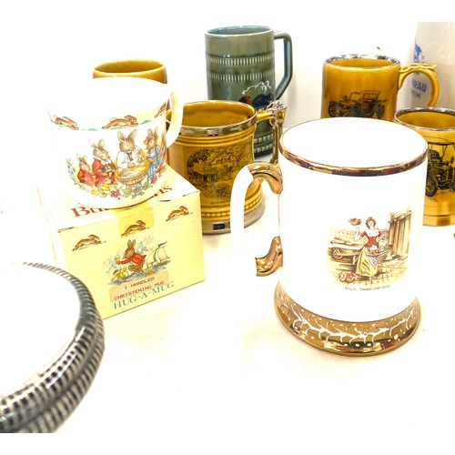 297 - Selection of assorted mugs includes Wade, Germany Tankard, Royal Doulton, Bunnykins etc