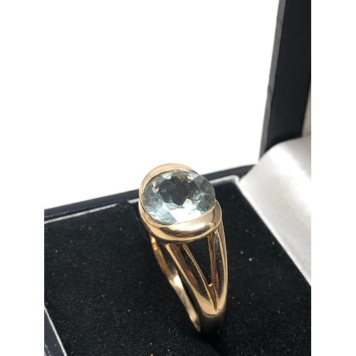 146 - 9ct gold light blue gemstone ring weight 5.5g