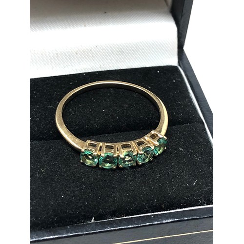 147 - 9ct gold green gemstone ring weight 2g