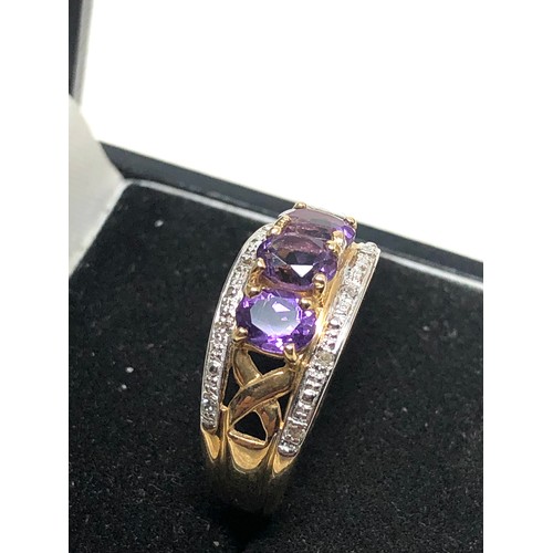 162 - 9ct gold Amethyst & diamond ring weight 4.4g