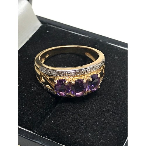 162 - 9ct gold Amethyst & diamond ring weight 4.4g