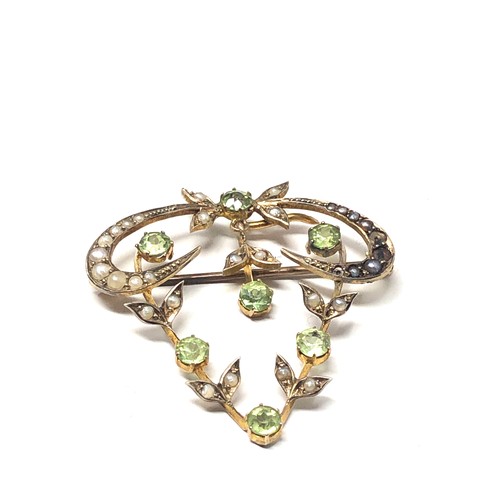 169 - Fine antique 9ct gold peridot & seed-pearl pendant /brooch measures approx 3.6cm drop by 3.5cm wide ... 