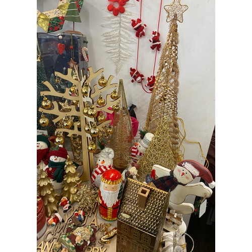 256 - Large selection of assorted Christmas decorations includes Tree figures, snow man decorations etc