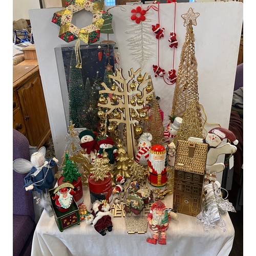 256 - Large selection of assorted Christmas decorations includes Tree figures, snow man decorations etc