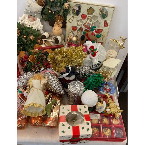 313 - Large selection of assorted Christmas decorations includes musical figures, metal reindeer figure, s... 