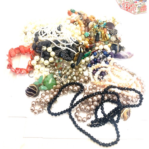 596 - Large selection of costume jewellery includes Mexican brooch, beads etc