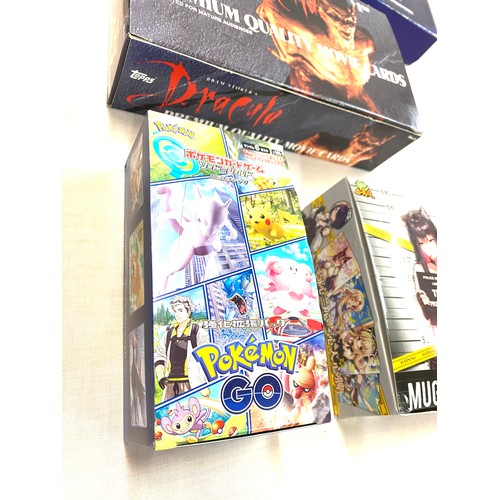 17 - Selection of empty card games boxes to include Barbed wire, Pokemon Go, Dracula, Golden Eye, Judge D... 