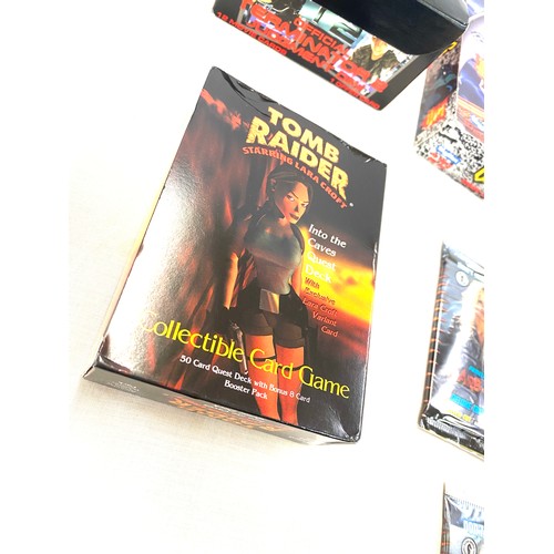 36 - Selection of trading cards to include Tomb Raider card game, Sealed Barbed wire Topps cards, Termina... 