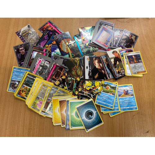 609 - Large selection of trading cards to include Pokemon, Terminator, Judger Dredd, Melting pot, Gilden e... 