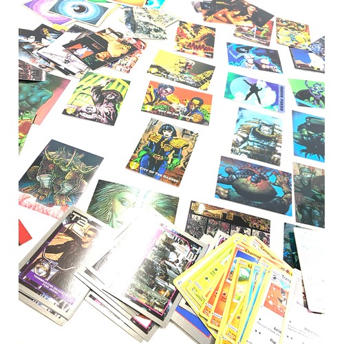 610 - Selection of assorted trading cards to include Pokemon, T2, Judge Dredd etc