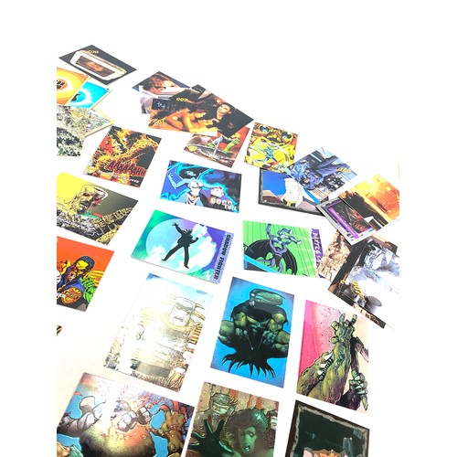 610 - Selection of assorted trading cards to include Pokemon, T2, Judge Dredd etc