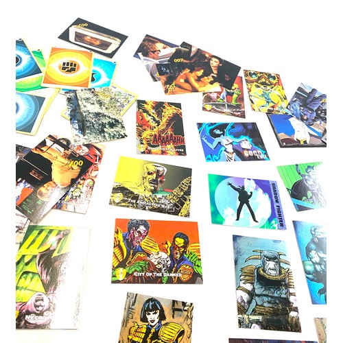 610 - Selection of assorted trading cards to include Pokemon, T2, Judge Dredd etc