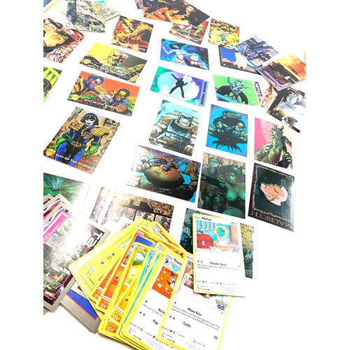 610 - Selection of assorted trading cards to include Pokemon, T2, Judge Dredd etc