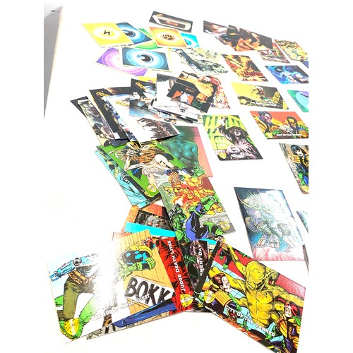 610 - Selection of assorted trading cards to include Pokemon, T2, Judge Dredd etc