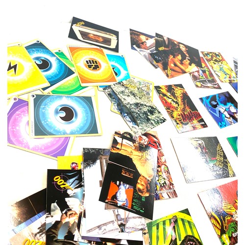 610 - Selection of assorted trading cards to include Pokemon, T2, Judge Dredd etc